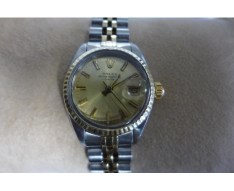 A ladies Rolex bi metal Oyster perpetual date bracelet wristwatch, 27mm wide including button, in good condition, running ord