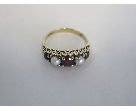 A 9ct pearl and garnet ring, size R, approx 3.3 grams, generally good 