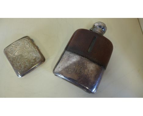 A silver plated hip flask with damaged top and a silver cigarette case, approx 2.1 troy oz 