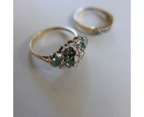 Two 9ct gold emerald and diamond rings, one approx 2.1 grams, size L, the other approx 1.3 grams, size K, one in good conditi