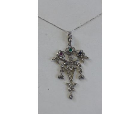A vintage 9ct tested diamond, ruby and sapphire pendant, with a 9ct modern white gold chain - pendant approx 5cm long, neckla