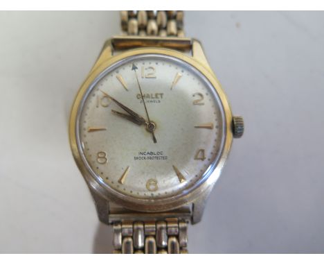 A chalet 21 jewel gold plated gents manual wind wristwatch, case 35mm wide, running order with rolled gold strap, some genera