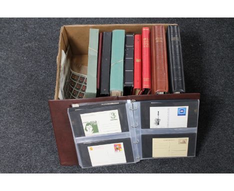 A box of a quantity of stamp albums containing a large collection of assorted stamps, first day covers 