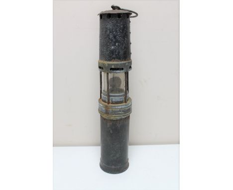 An early oversized miner's lamp 