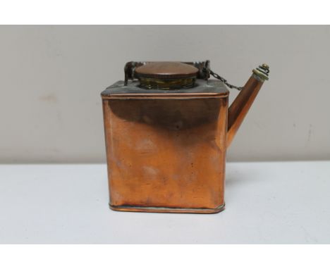 An antique copper lamp lighter's flask 