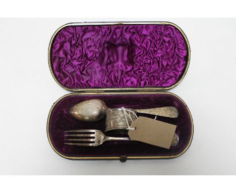 A cased silver fork and spoon with napkin ring, Birmingham 1882 