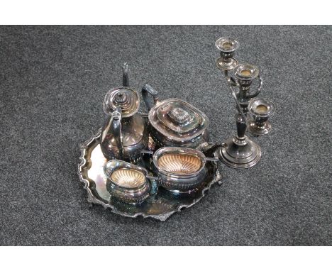 A four piece Sonsdale silver plated tea service on tray together with three way candelabrum