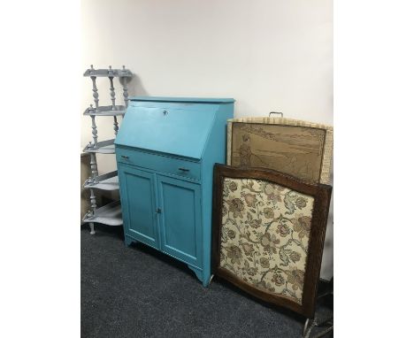 A painted oak lady's bureau, five tier corner what not stand, Art Nouveau fire screen and a tapestry fire screen 