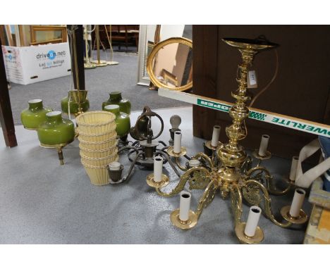 An eight way continental brass light fitting together with a six way light fitting 