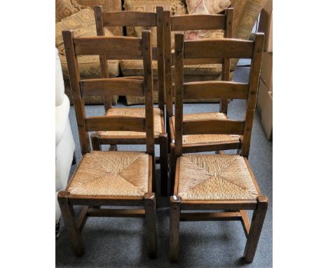 A set of four rustic ladder back chairs with rush seats (4)