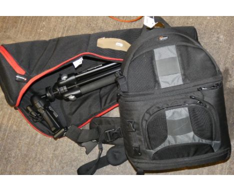 A Manfrotto tripod in fitted bag together with rucksack