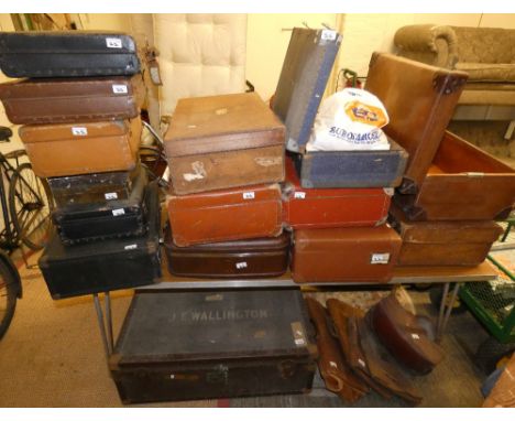 A selection of suitcases, attaché cases, trunk, some with contents, includes fitted leather suitcase and two other leather su