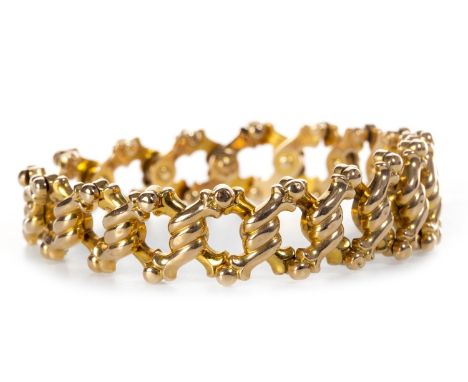 VICTORIAN EXPANDING BRACELET, formed by twist motif links each 15mm high when fully retracted, marked 15 and BADEN, 15.4g