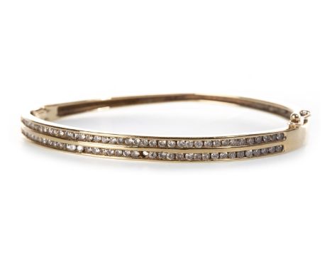 WHITE GEM SET TWO ROW BANGLE, with two rows of channel set white gems, 64mm to outer edge, unmarked, 12.6g