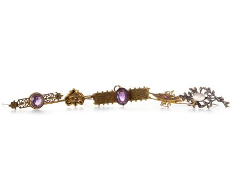 GROUP OF VICTORIAN AND LATER BROOCHES, including two Victorian purple gem set bar brooches, one with pierced decoration, the 