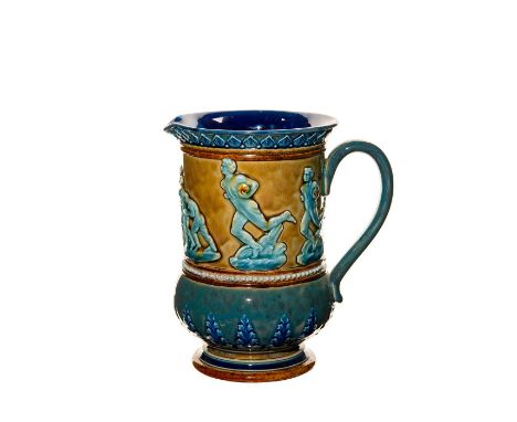Mottled buff ground; blue and tan; frieze of figures playing rugby in relief. Contrasting slip glazed ground; beaded borders 