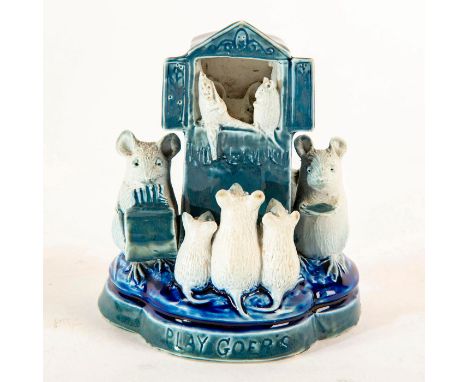 Blue and grey glazed stoneware; modeled as mice watching and performing a Punch and Judy puppet show. Impressed artist initia