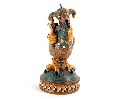 Stoneware; modeled as a grotesque bird with puppet jester bird in hand; highly detailed. Number 28 in a limited edition of 65