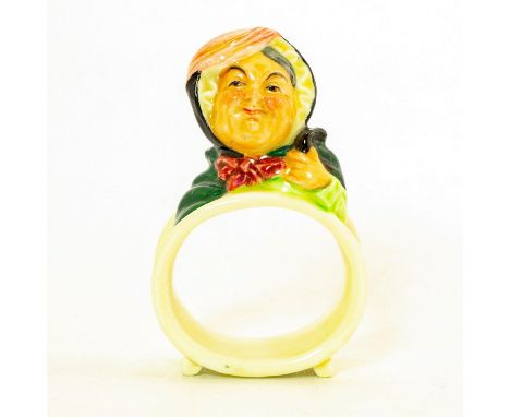 Ceramic napkin ring with a mini bust of Sairey Gamp on the top. Sarah or Sairey Gamp, Mrs. Gamp as she is more commonly known