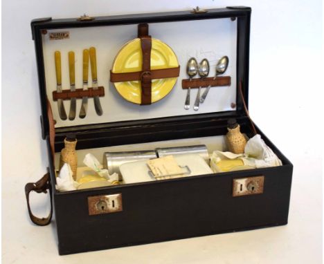 1930s style picnic set with leather strap handles including to the interior various cups and saucers plus thermos flask