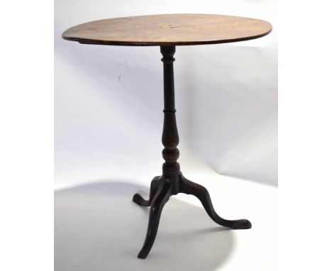 Mahogany oval pedestal table raised on ring turned support with tripod base, 61.5cm wide