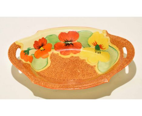 Clarice Cliff shallow dish, shape 534, decorated with the Nasturtium pattern, with two reticulated handles, 26cm long, factor