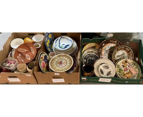 Three boxes of assorted china mainly pottery and ceramic floral and other plates, mugs, egg cups etc.   (3)   (B.P. 21% + VAT