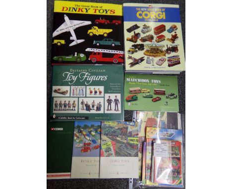 Box of Britains toy brochures together with various hard back books on toys: 'Britains Civilian Toy Figurines', 'The New Grea