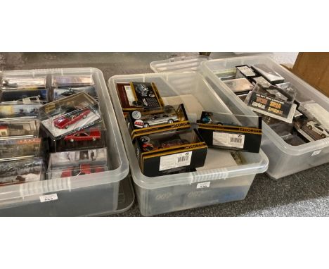 Four plastic boxes of Corgi and other 007 James Bond diecast model vehicles, various films to include: 'For Your Eyes Only', 