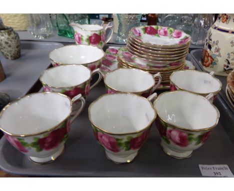 Tray of Royal Albert 'Old English Roses' teaware: six cups, saucers and tea plates, sandwich plate, sugar basin and milk jug.