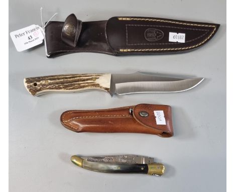Spanish Muela Pointer drop point sheath knife with horn scales, in leather scabbard.  Overall 25cm approx.  together with a F