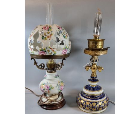 Sevres French porcelain table lamp in blue and white with gilded decoration of flowers and foliage together with a continenta