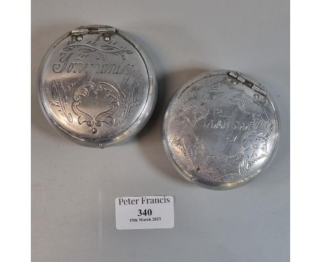 Two tin vintage snuff boxes of circular form. one marked Llanelly, the other marked Tonypandy.  (2)  (B.P. 21% + VAT) 
