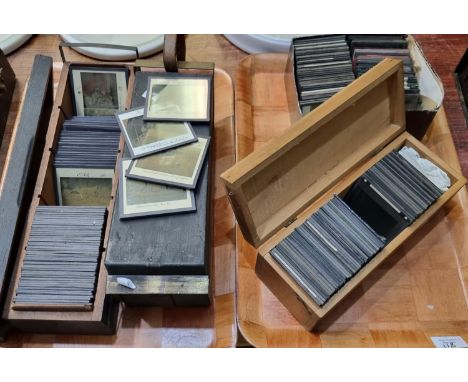 Large collection of Victorian glass magic lantern slides, varying genres to include: figures, Welsh lady, topographical, ligh
