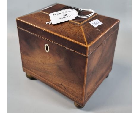 Small 18th century Georgian mahogany tea caddy with satinwood banding on brass ball feet, loop handle to the hinged cover.  (