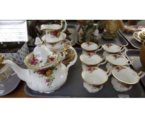 Tray of Royal Albert 'Old Country Roses' teaware: teapot, sugar basin, milk jug, six cups and saucers and five tea plates.   