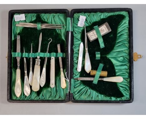 Vintage mother of pearl and steel manicure set, to also include a mother of pearl fruit knife.  (B.P. 21% + VAT) 