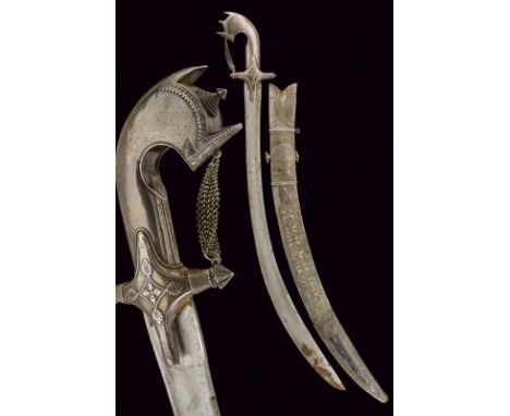 dating: circa 1800 provenance: Arabian Peninsula, Wide, curved, single-and false-edged blade with large fuller and tang; hilt