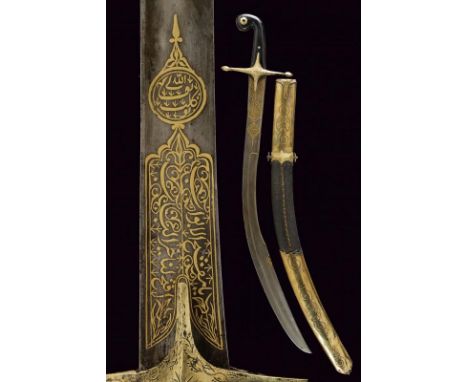 dating: 19th Century provenance: Turkey, Curved, single-and-false-edged blade, in fine wootz damask, with 'T'-back with three