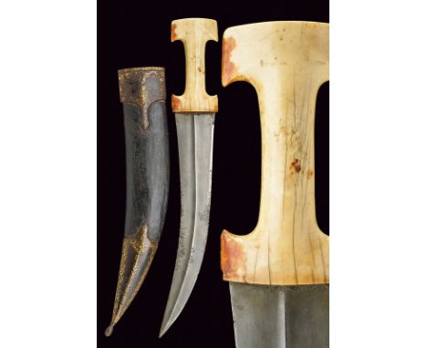 dating: circa 1800 provenance: Turkey, Wide, long, curved, double-edged damascus blade with central raiser, rust areas; doubl