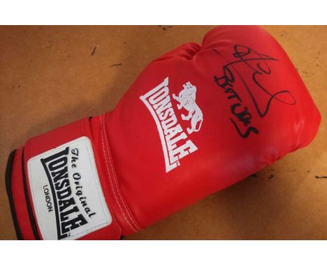 Joe Calzaghe autographed boxing glove. Red Lonsdale full size boxing glove autographed by boxer Joe Calzaghe, former WBA, WBC