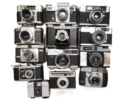 A quantity of camera's to include: a Ukrainian Kiev-4; Vokar; Yashica 35W; Petri 7 S; a Richoh Super Shot; a Braun Paxette; a