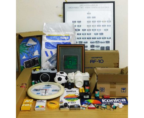 A quantity of camera promotional and point-of-sale material: to include a Leica 'Family Tree' framed poster; Olympus counter 