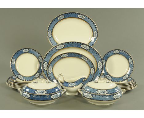 A Burleigh Ware six place dinner service, circa 1930/40, with blue printed scale ground decoration to the borders with floral