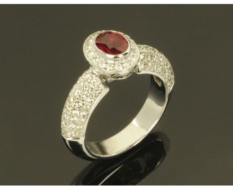 An 18 ct white gold Burmese ruby and diamond ring, ruby +/- 1 carat, size P (see illustration).