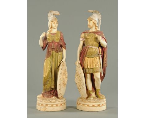 A pair of Royal Dux figures, modelled as male and female Roman soldiers, early 20th century, each wearing a plumed helmet and