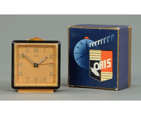 An Art Deco period Oris travel alarm clock, within original fitted presentation box.