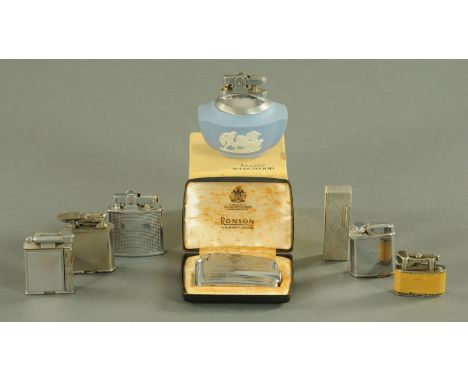 A vintage miniature Dunhill lighter, together with a further seven vintage and collectable lighters.