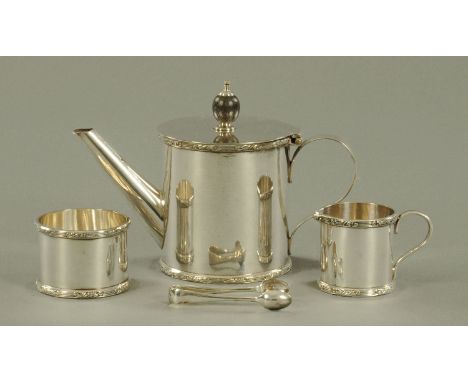An Asprey for Harrods bachelor tea service, comprising teapot, sugar basin with tongs and jug.  Teapot height 11 cm, length 1
