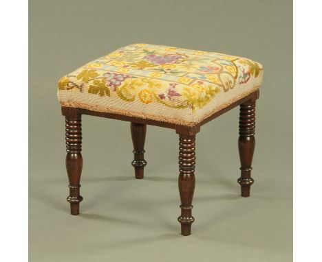 A Victorian mahogany stool, with woolwork tapestry top raised on four turned legs.  Top 40 cm square.